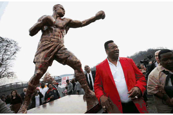 LARRY-HOLMES-STATUE.gif