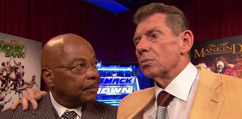 Teddy Long y Vince McMahon