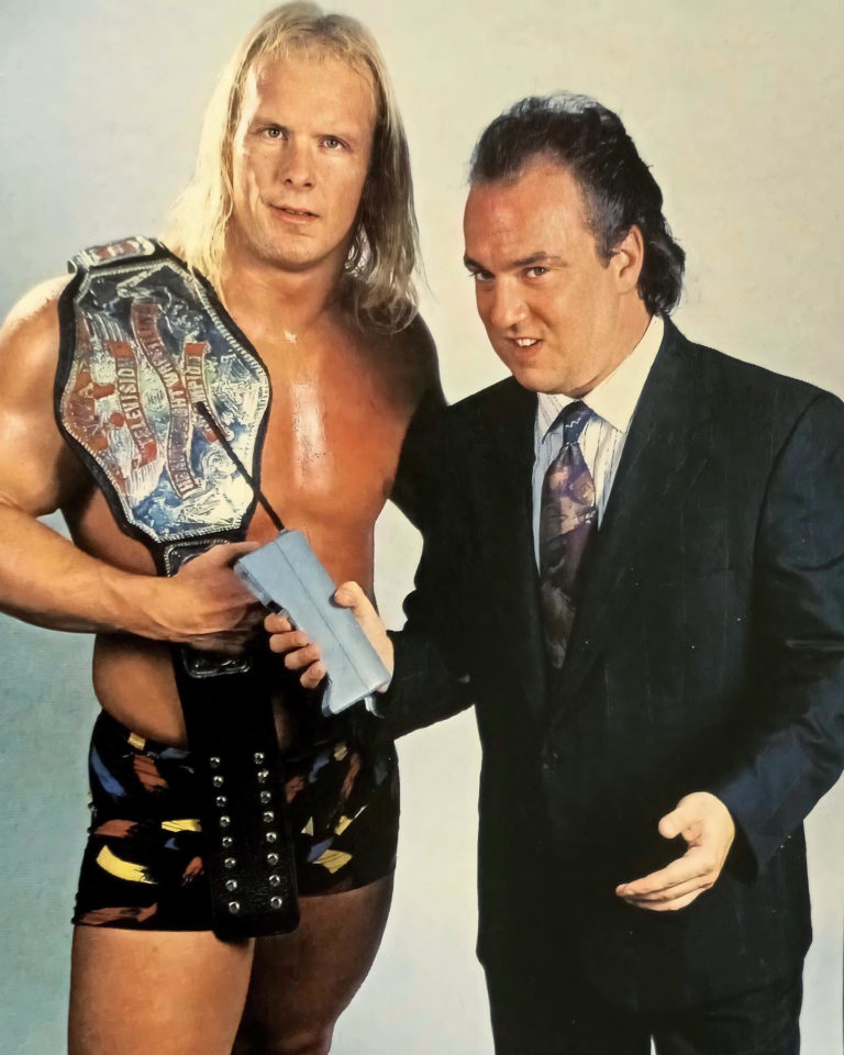 Steve Austin con Paul Heyman