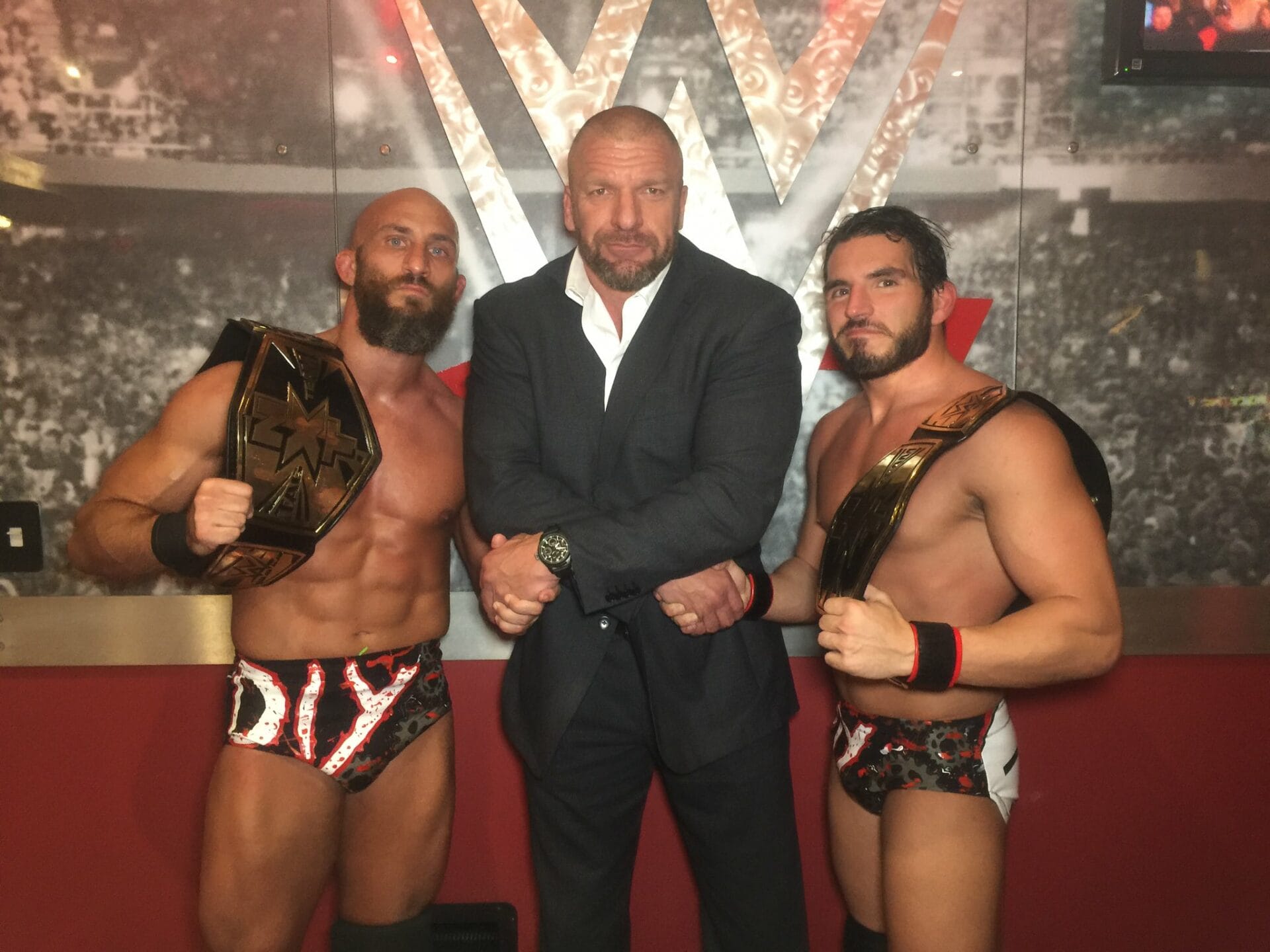 Tommaso Ciampa, Triple H y Johnny Gargano