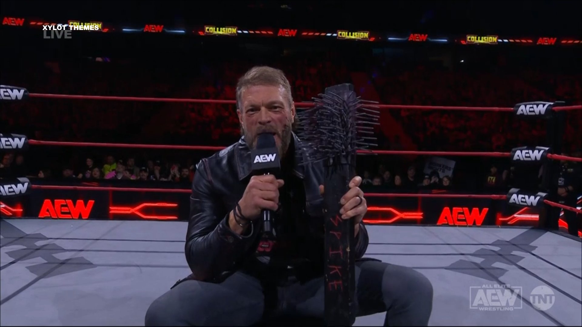 AEW Collision 16 de diciembre de 2024 008 Adam Copeland Edge y Spike, una tabla con alambre de púas