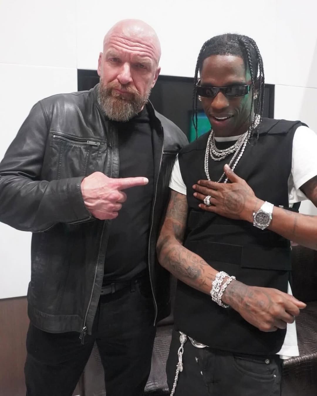 Triple H y el rapero Travis Scott