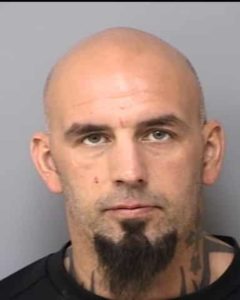 Travis Tomko (Mug shot - 10.10.11)